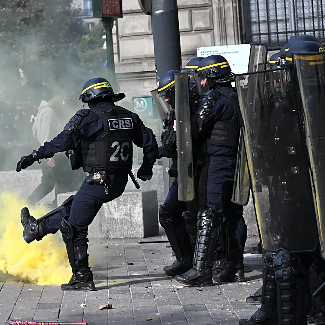 Scuffles and fires break out as protesters rally across France, joining students