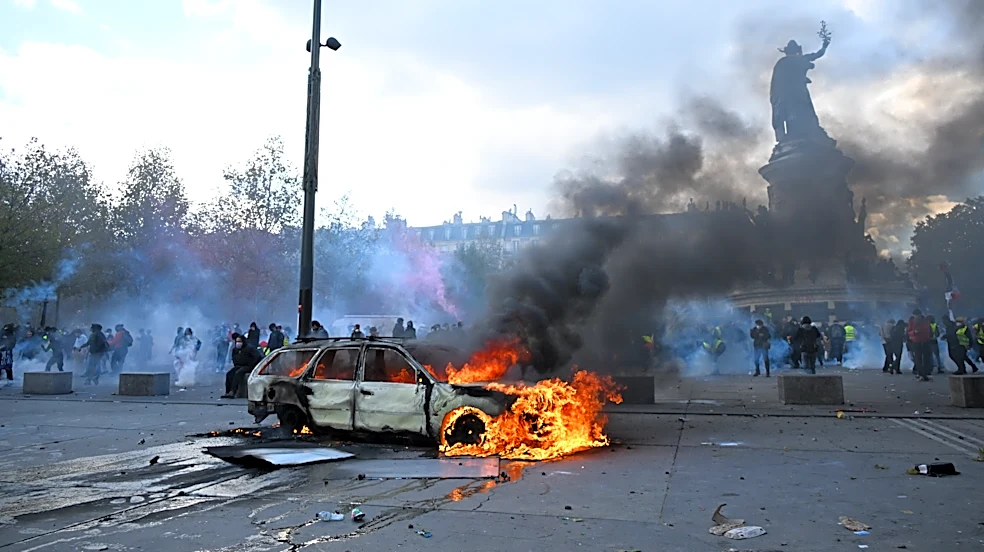 Clashes and fires break out as protesters rally across France, joining students