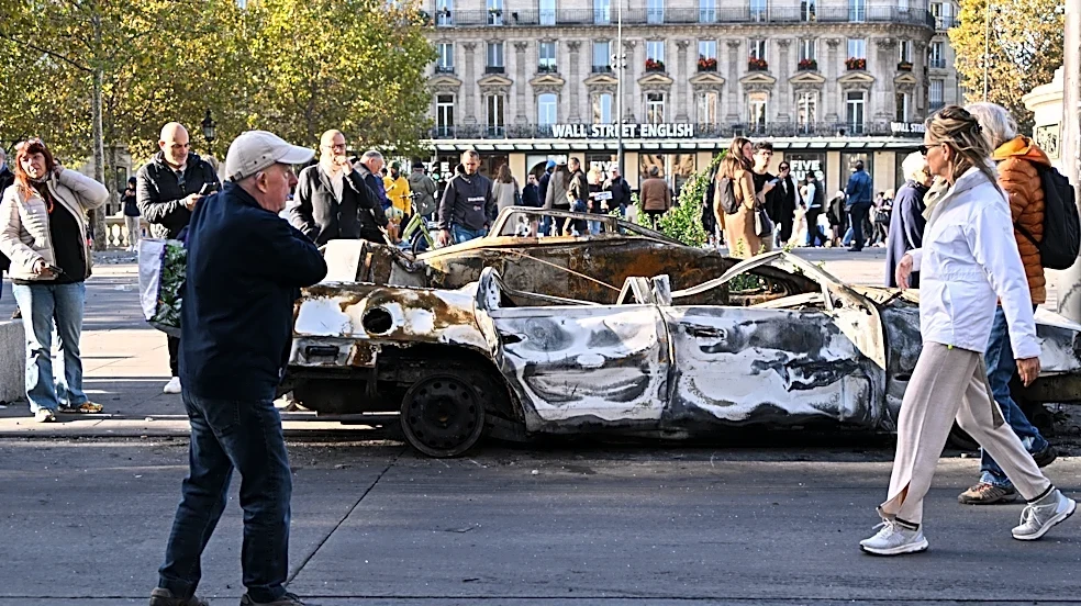 French police arrest 1,800 after violent clashes and looting mar protests
