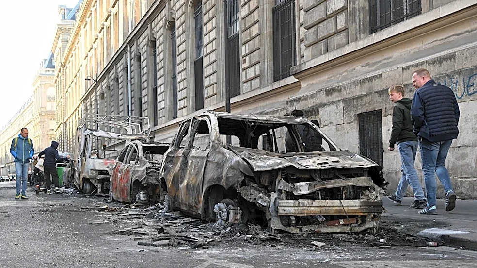 Macron to address nation after riots and looting lead to 1,800 arrests across France