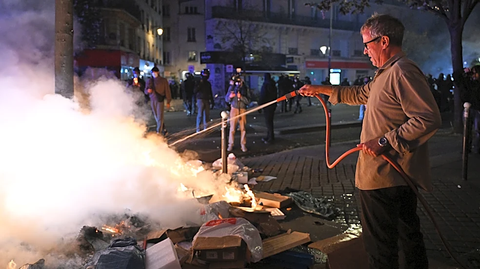 Macron condemns those who 'sought to bring down the Republic' after rioting mars nationwide protests