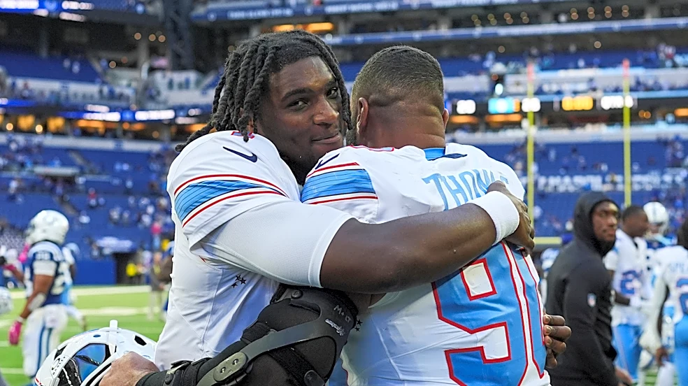 Titans use special teams plays and defense to rally past Colts 26-20 for 1st win of the season