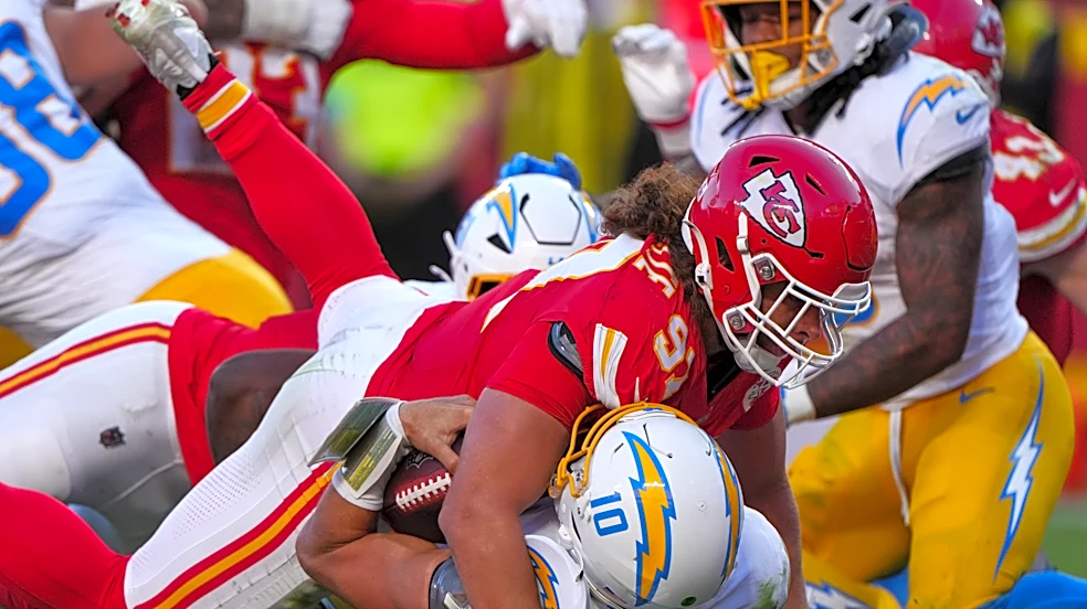 Harbaugh says Chargers will evaluate everything after 22-6 loss to Chiefs drops them to 0-6