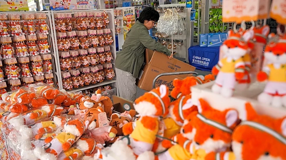 China's economy accelerates on robust exports as domestic weakness persists
