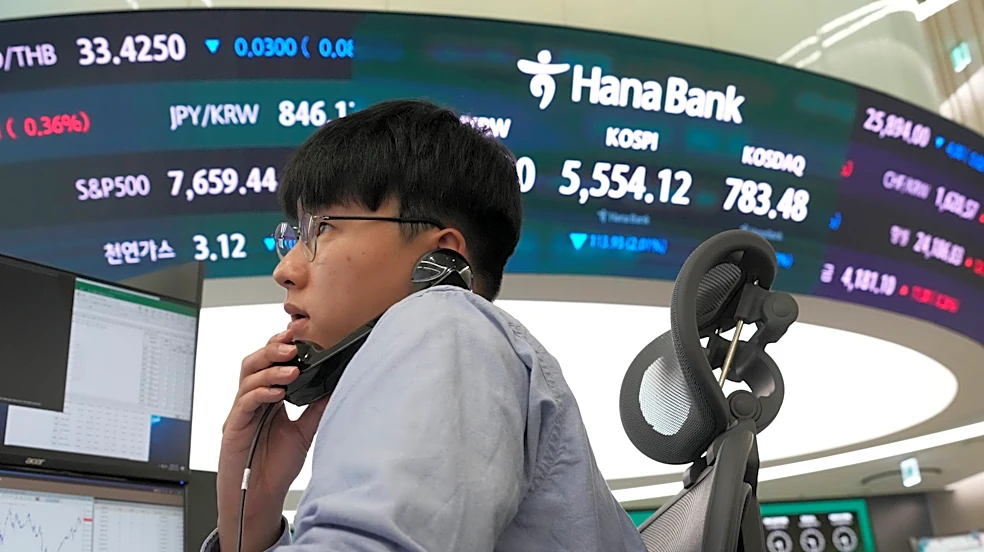 Asian shares are mixed with tech stocks volatile, and oil falls on Trump's Russian sanctions waiver
