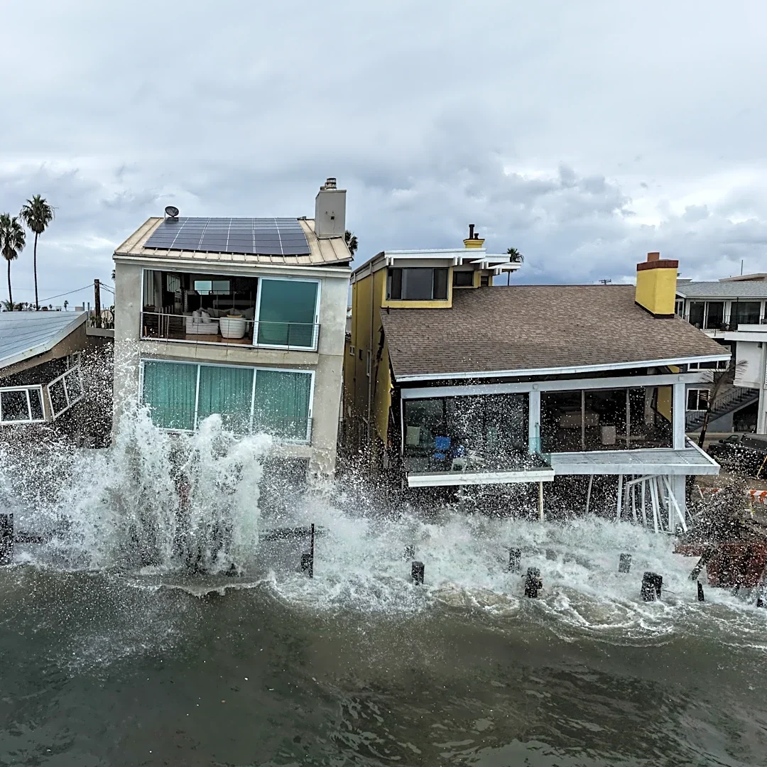 Using a drone, AP's Jae C. Hong frames Long Beach's waves crashing into oceanfront homes