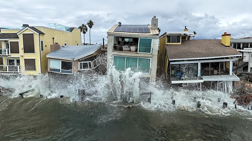 Using a drone, AP's Jae C. Hong frames Long Beach's waves crashing into oceanfront homes