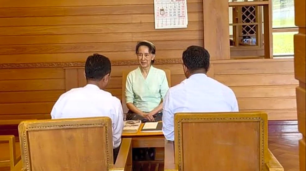 Rare photos of Myanmar's ex-leader Suu Kyi show her receiving books sent by King Charles III