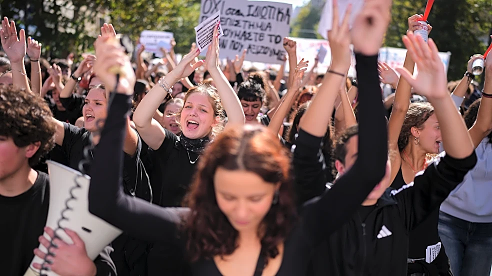 Thousands of students and teachers march through Greek capital to protest high cost of living