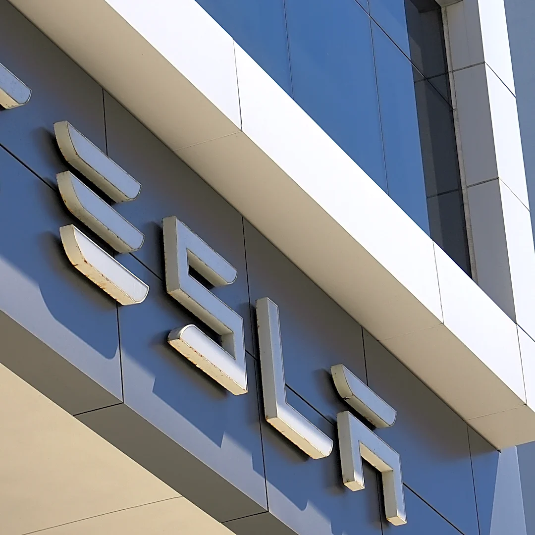 Tesla's Q3 profit drops as it prepares for possible merger with Musk's other public company, SpaceX