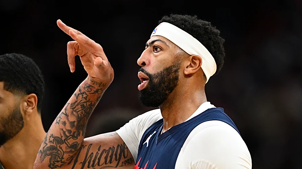 Davis scores 34 points in his Washington debut, leading the Wizards over Milwaukee 128-116