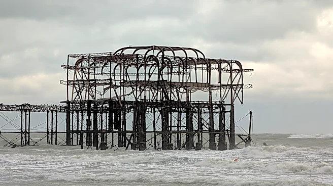 Part of famous Brighton pier collapses as Atlantic storms sweep into England
