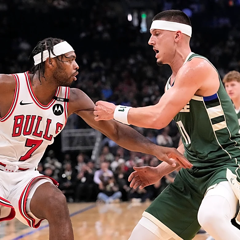 Powell scores 25 points to help the Bulls hold off the Bucks, 132-125