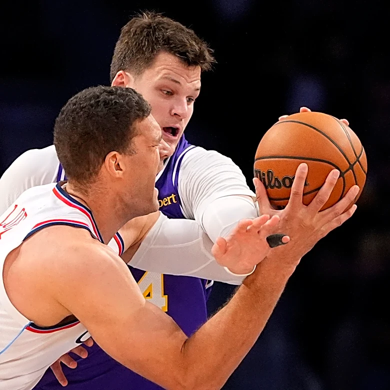 Austin Reaves, Walker Kessler lead Lakers past Clippers 125-117 for 2nd win to start season
