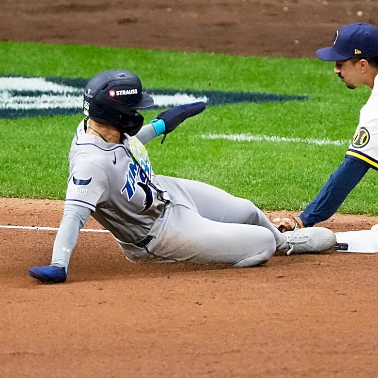 Balls glancing off gloves, runners thrown out trying to steal sink Rays in World Series opener
