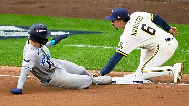 Balls glancing off gloves, runners thrown out trying to steal sink Rays in World Series opener