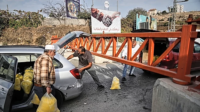 Israel imposes closures across a West Bank city after attacks, and other Mideast news