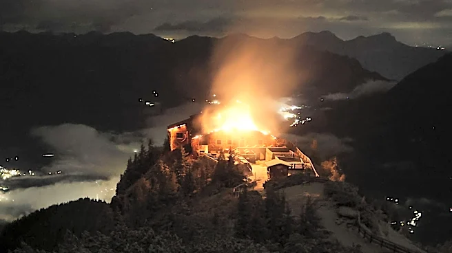 A fire devastates the Eagle's Nest retreat built for Hitler in Germany. A suspect is detained
