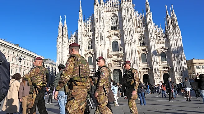 Soldiers guard center of Milan as thousands of protesters march across European cities