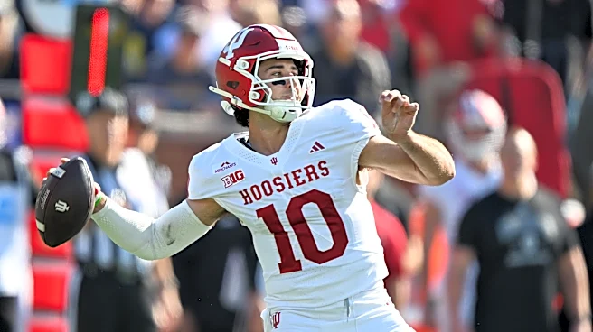 Hoover's TD run lifts No. 6 Indiana to 13-6 OT win at Michigan, its 1st win at Big House since 1967
