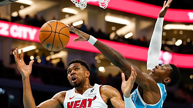 Brandon Miller scores 34 points as the Hornets beat the winless Heat 115-110
