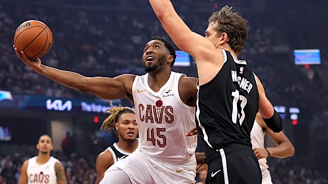 Cavaliers survive a late Nets rally to win home opener 125-121