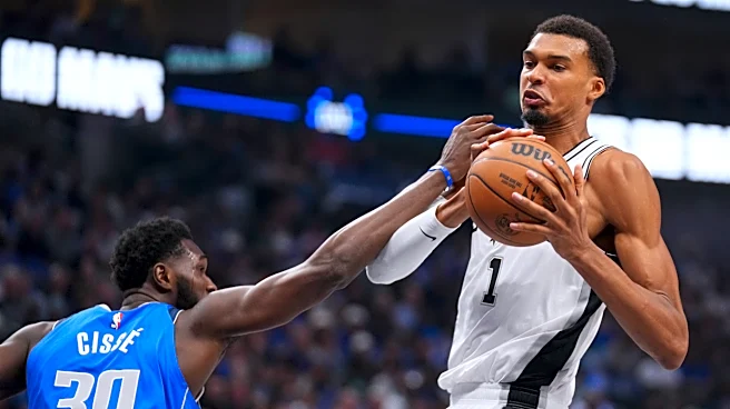 Wembanyama, Harper lead Spurs past short-handed Mavericks 122-106 for their first victory