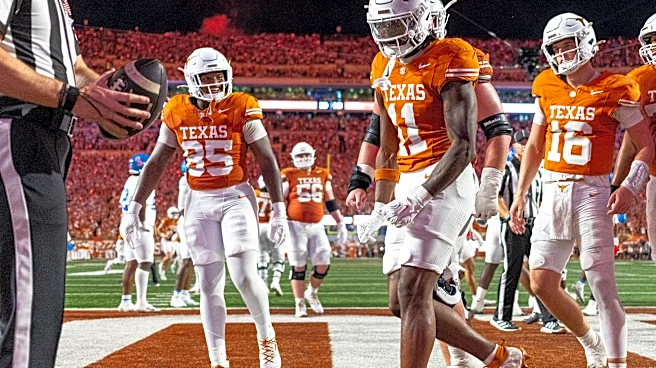 Arch Manning and No. 19 Texas hang on to beat No. 7 Ole Miss 34-27 after blowing 21-point lead