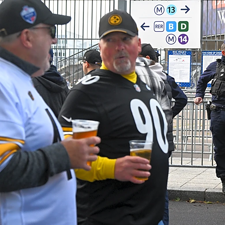 Good mood among fans attending the first NFL game in Paris, a day after protests and clashes