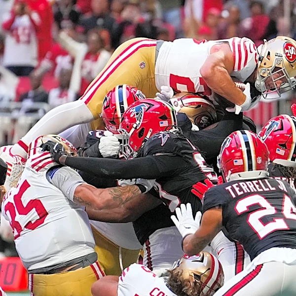 49ers star McCaffrey sustains hip injury, but returns to field against Falcons