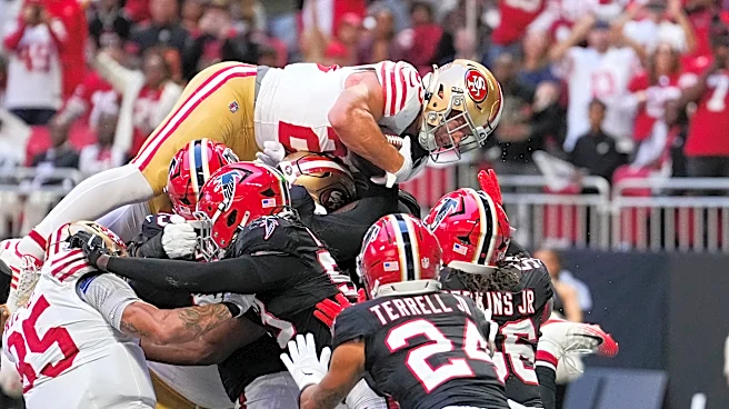 49ers star McCaffrey sustains hip injury, but returns to field against Falcons