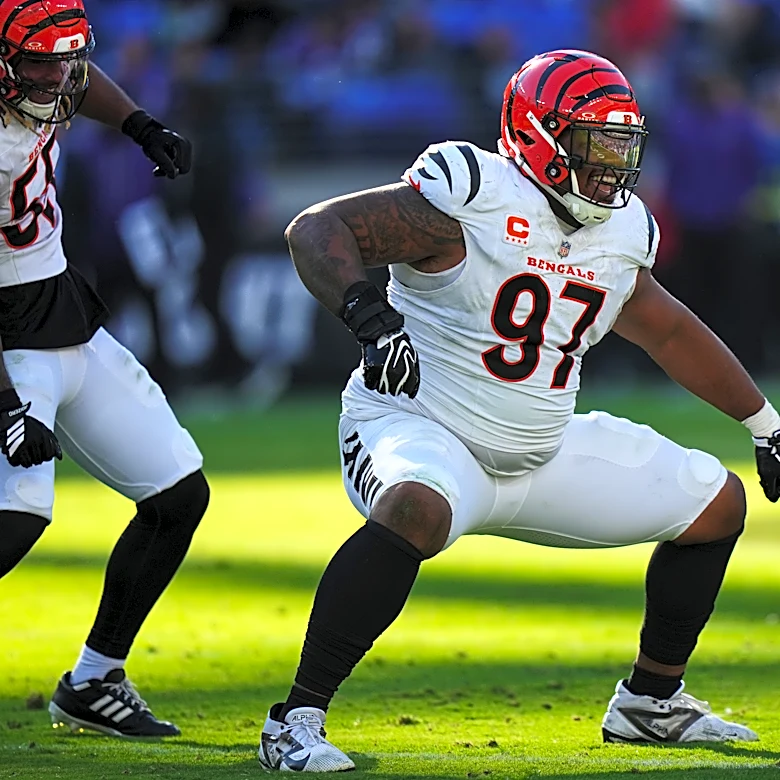 Burrow throws 4 TD passes as Bengals storm past Jackson-less Ravens in 2nd half of 35-13 win