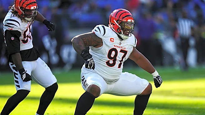 Burrow throws 4 TD passes as Bengals storm past Jackson-less Ravens in 2nd half of 35-13 win