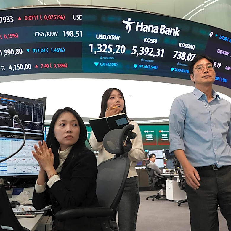 Shares fall in Asia after a decline on Wall Street, and oil prices fall more than 1%