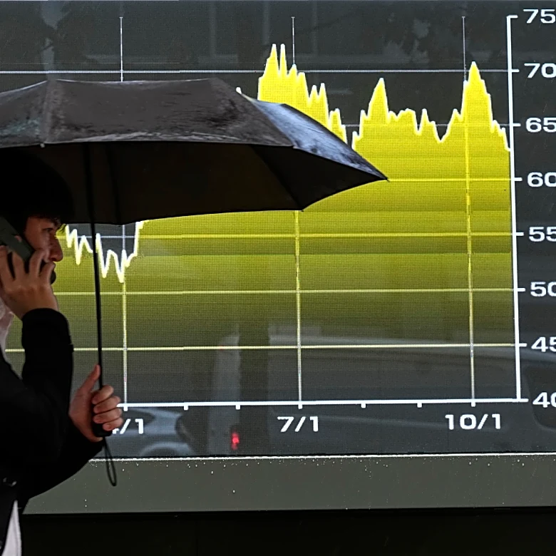 World shares mostly advance after a decline on Wall Street, and oil prices fall more than 1%