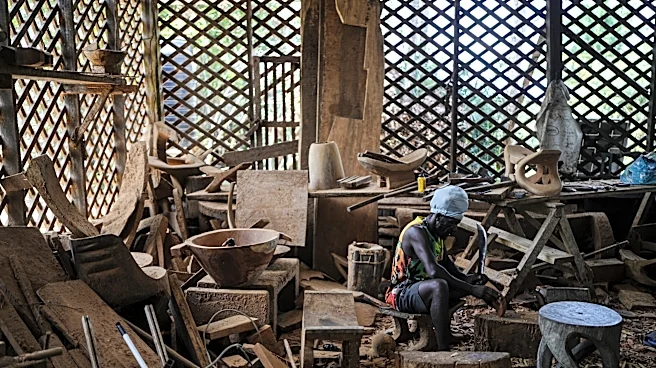 In Suriname's rainforest, Saamaka woodcarvers face the pull of gold mining and logging