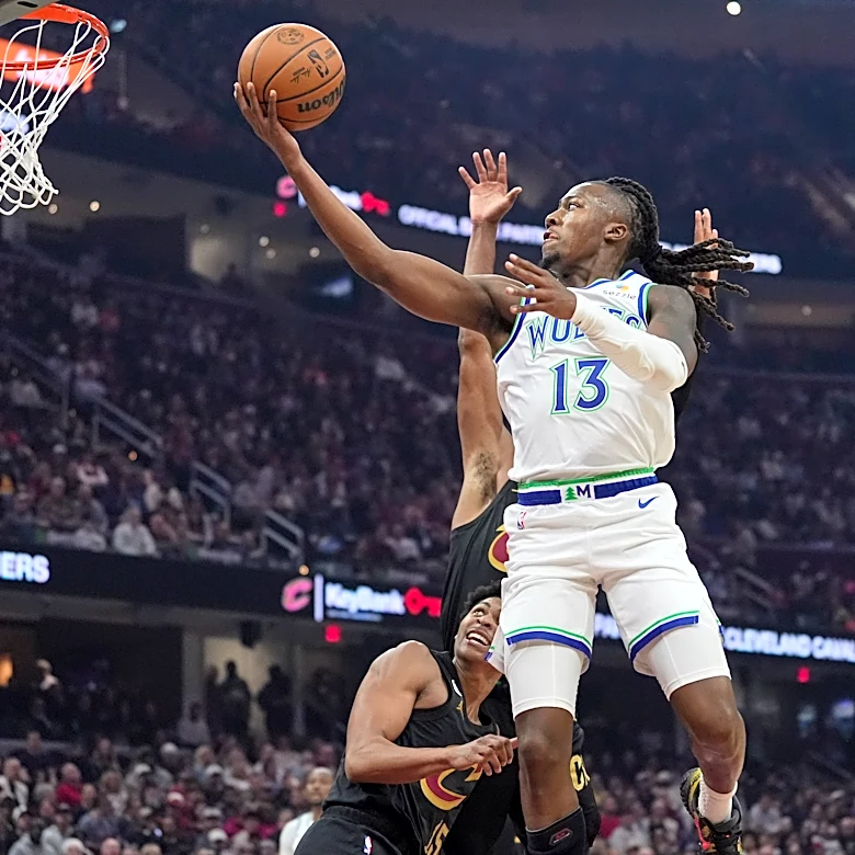Mitchell scores 26 as Cavaliers rally and defeat Timberwolves 127-125 in overtime
