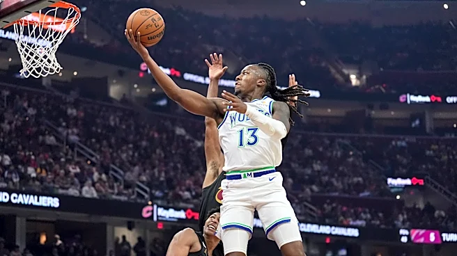 Mitchell scores 26 as Cavaliers rally and defeat Timberwolves 127-125 in overtime