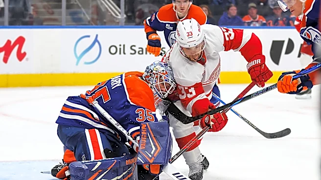Raymond scores in shootout to lift Red Wings to 4-3 decision over Oilers