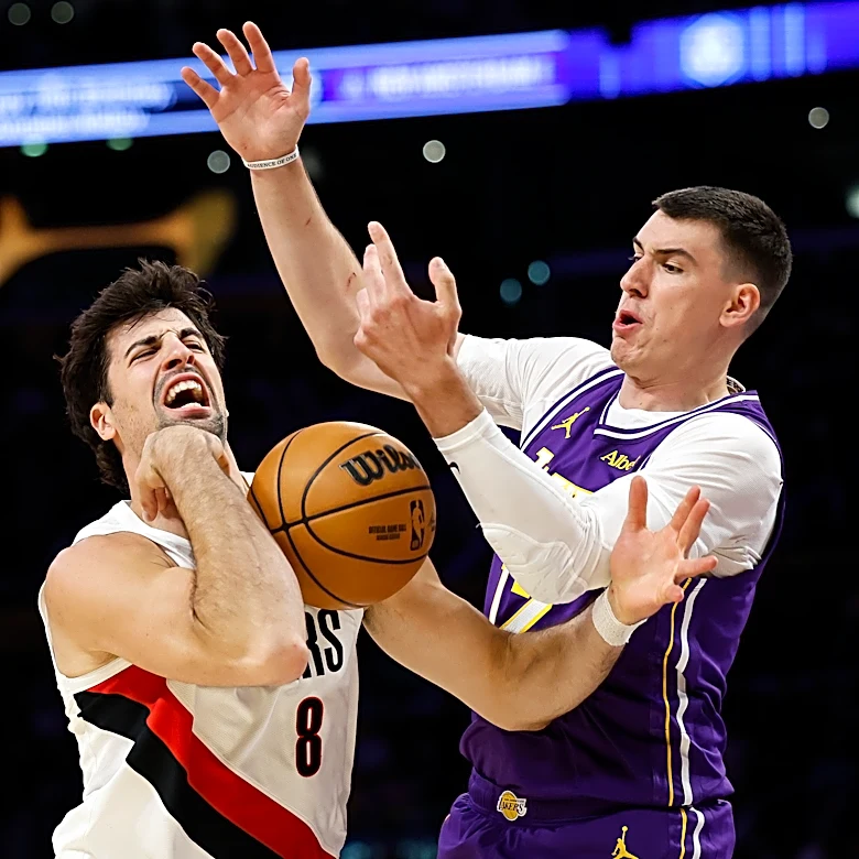 Ja Morant, Damian Lillard lead unbeaten Trail Blazers past Lakers 136-129 despite Luka Doncic's 41