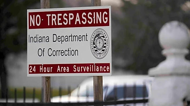 Indiana governor is urged to let death sentence proceed against man who killed 2 kids in fire