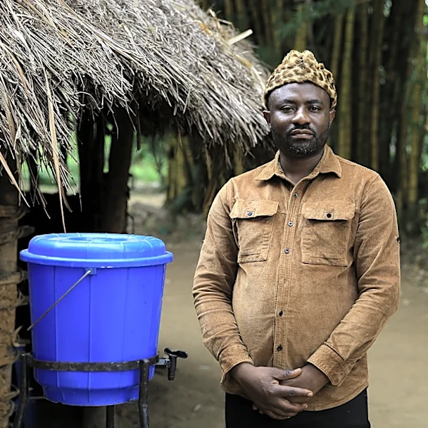 A village chief in Congo works to overcome Ebola prejudice even as the disease kills his relatives