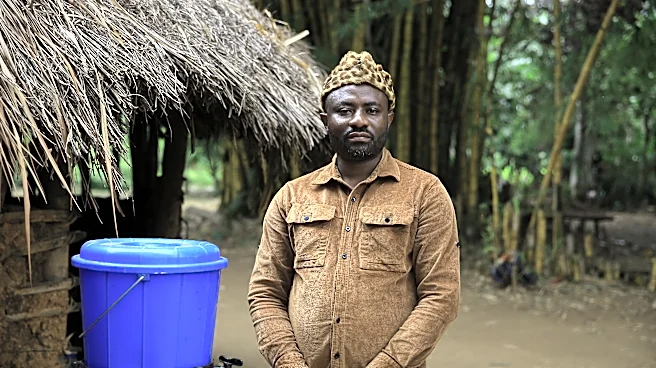 A village chief in Congo works to overcome Ebola prejudice even as the disease kills his relatives