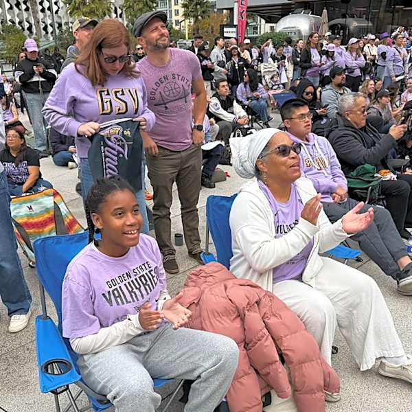 Young girls skip school with their parents to attend Valkyries' early WNBA Finals watch party