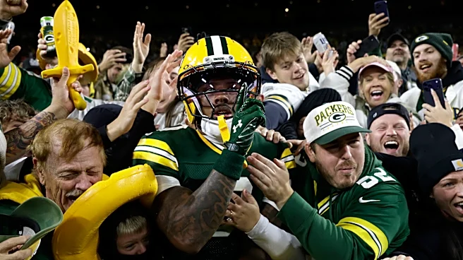 Love throws 3 TD passes as the Packers beat the Panthers 27-19