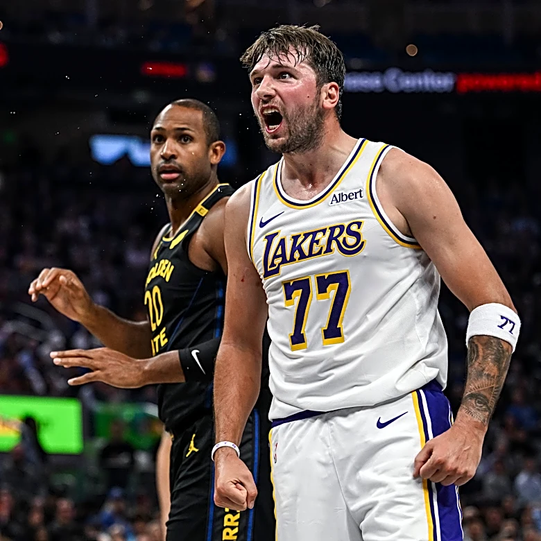 Stephen Curry scores 31 points and outduels Luka Doncic as Warriors come back to beat Lakers 112-95