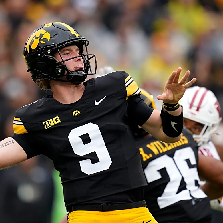 Hank Brown throws for 222 yards and two touchdowns as Iowa shuts out No. 25 Wisconsin 30-0