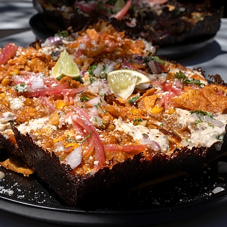 The Pembertons' new head pizza chef marries Detroit pie and Tex-Mex