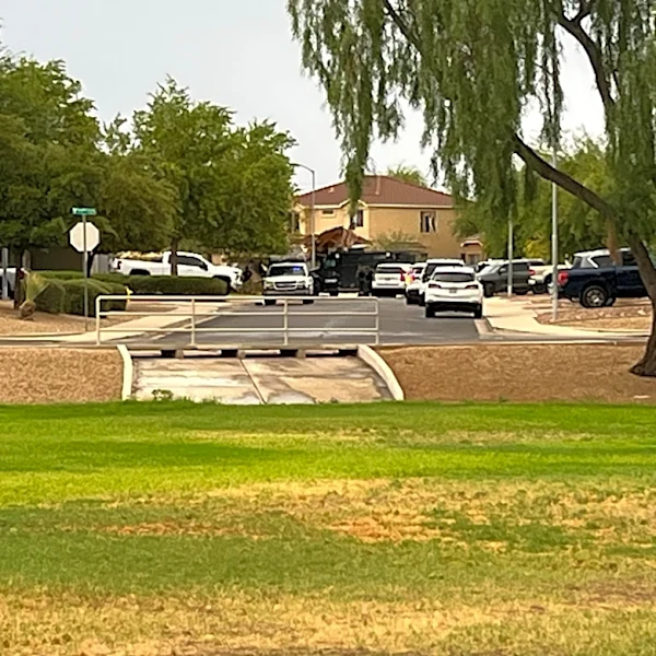Glendale police exchange gunfire with barricaded suspect