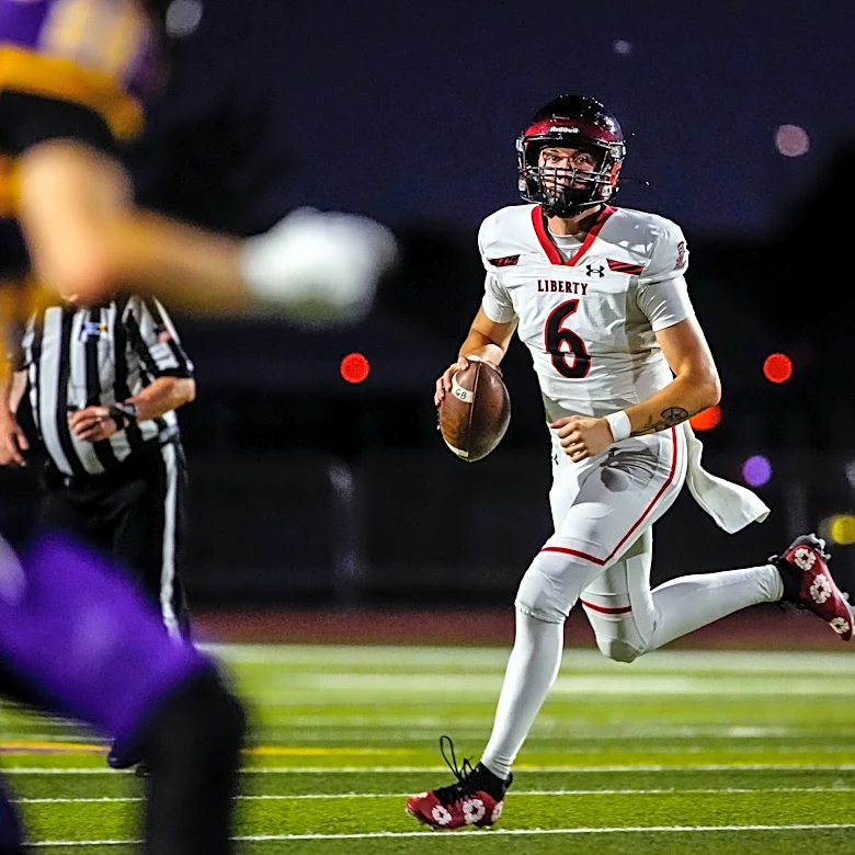 Liberty football makes big statement in blowout win over Mesa